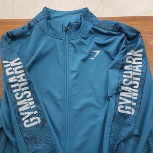 Gymshark jacket with pockets size large for men and women. Excellent condition.